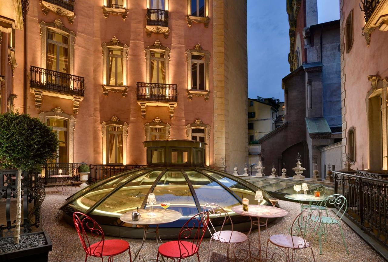 Chateau Monfort - Relais & Chateaux Milano Esterno foto The hotel's courtyard