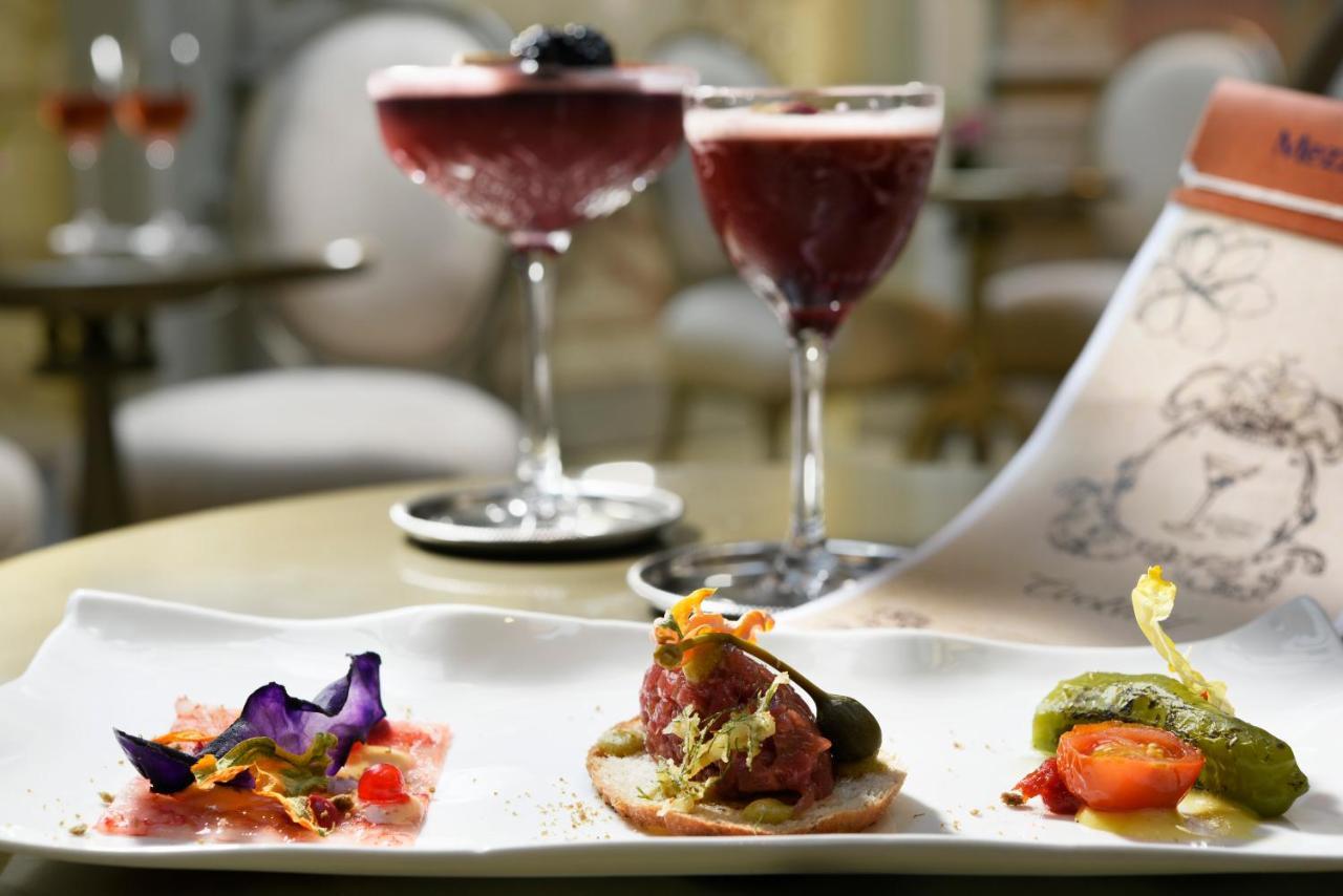 Chateau Monfort - Relais & Chateaux Milano Esterno foto A selection of tapas
